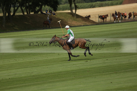 Jaeger Le Coultre (black)  v Wairakei Pastoral (white) in a Jaeger Le Coultre Holden White Cup polo match played on 29 July 2013 at Cowdray Park Polo Club on Brooksfieldwww.polopictures.co.uk
