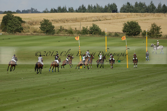Jaeger Le Coultre (black)  v Wairakei Pastoral (white) in a Jaeger Le Coultre Holden White Cup polo match played on 29 July 2013 at Cowdray Park Polo Club on Brooksfieldwww.polopictures.co.uk