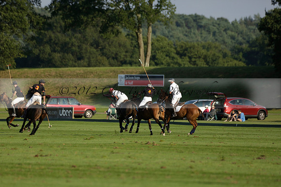 Pluma Negra (white) v Shoreline (black) in the Brecknock Cup Subsidiary final polo match played on Sunday 25 August 2013 at Cowdray Park Polo Club on Ambersham 1. 2013.10.12 www.polopictures.co.uk