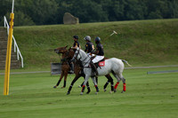 Pluma Negra (white) v Shoreline (black) in the Brecknock Cup Subsidiary final polo match played on Sunday 25 August 2013 at Cowdray Park Polo Club on Ambersham 1. 2013.10.12 www.polopictures.co.uk