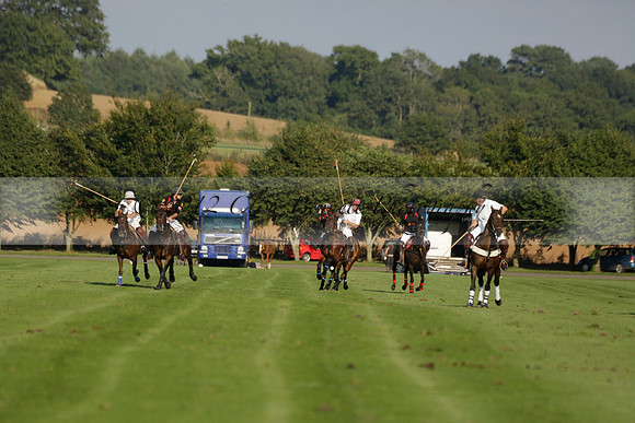 Pluma Negra (white) v Shoreline (black) in the Brecknock Cup Subsidiary final polo match played on Sunday 25 August 2013 at Cowdray Park Polo Club on Ambersham 1. 2013.10.12 www.polopictures.co.uk