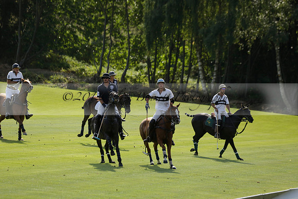 Pandas (white) v Home Farm (navy) in a Park House West Sussex Cup Polo match on Brooksfield at Cowdray Park Polo Club on Friday 30 August 2013. 2013.08.30 www.polopictures.co.uk