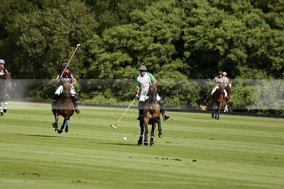 Jaeger Le Coultre (black)  v Wairakei Pastoral (white) in a Jaeger Le Coultre Holden White Cup polo match played on 29 July 2013 at Cowdray Park Polo Club on Brooksfieldwww.polopictures.co.uk