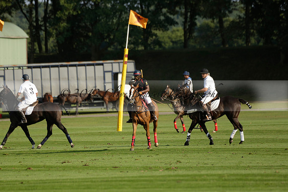 Pluma Negra (white) v Shoreline (black) in the Brecknock Cup Subsidiary final polo match played on Sunday 25 August 2013 at Cowdray Park Polo Club on Ambersham 1. 2013.10.12 www.polopictures.co.uk
