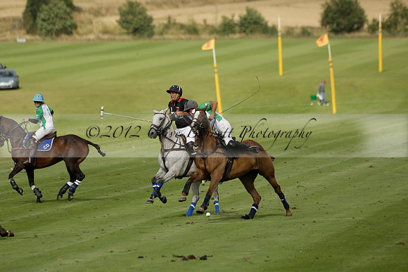Jaeger Le Coultre (black)  v Wairakei Pastoral (white) in a Jaeger Le Coultre Holden White Cup polo match played on 29 July 2013 at Cowdray Park Polo Club on Brooksfieldwww.polopictures.co.uk