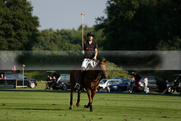 Pluma Negra (white) v Shoreline (black) in the Brecknock Cup Subsidiary final polo match played on Sunday 25 August 2013 at Cowdray Park Polo Club on Ambersham 1. 2013.10.12 www.polopictures.co.uk