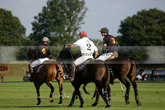 Pluma Negra (white) v Shoreline (black) in the Brecknock Cup Subsidiary final polo match played on Sunday 25 August 2013 at Cowdray Park Polo Club on Ambersham 1. 2013.10.12 www.polopictures.co.uk