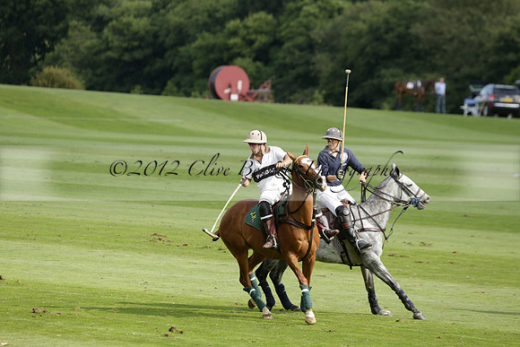 Pandas (white) v Home Farm (navy) in a Park House West Sussex Cup Polo match on Brooksfield at Cowdray Park Polo Club on Friday 30 August 2013. 2013.08.30 www.polopictures.co.uk