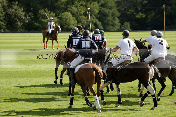 Pandas (white) v Home Farm (navy) in a Park House West Sussex Cup Polo match on Brooksfield at Cowdray Park Polo Club on Friday 30 August 2013. 2013.08.30 www.polopictures.co.uk
