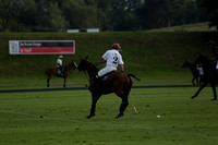 Pluma Negra (white) v Shoreline (black) in the Brecknock Cup Subsidiary final polo match played on Sunday 25 August 2013 at Cowdray Park Polo Club on Ambersham 1. 2013.10.12 www.polopictures.co.uk