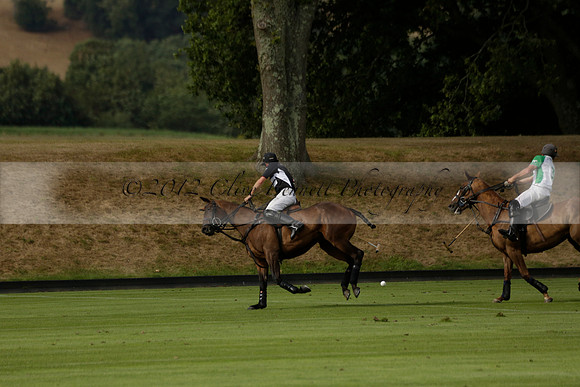 Jaeger Le Coultre (black)  v Wairakei Pastoral (white) in a Jaeger Le Coultre Holden White Cup polo match played on 29 July 2013 at Cowdray Park Polo Club on Brooksfieldwww.polopictures.co.uk