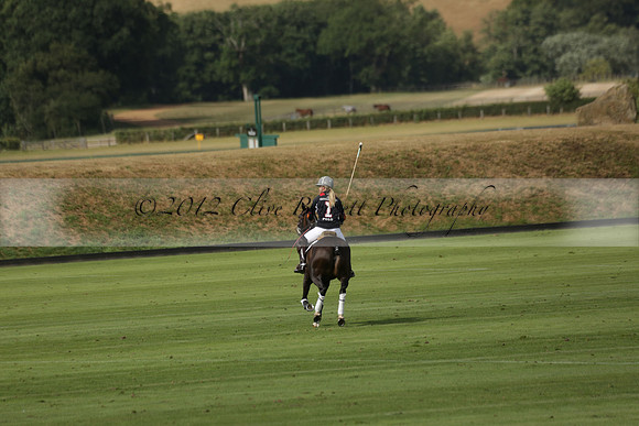 Jaeger Le Coultre (black)  v Wairakei Pastoral (white) in a Jaeger Le Coultre Holden White Cup polo match played on 29 July 2013 at Cowdray Park Polo Club on Brooksfieldwww.polopictures.co.uk