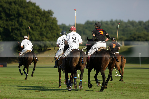 Pluma Negra (white) v Shoreline (black) in the Brecknock Cup Subsidiary final polo match played on Sunday 25 August 2013 at Cowdray Park Polo Club on Ambersham 1. 2013.10.12 www.polopictures.co.uk