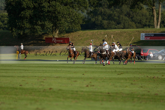 Pluma Negra (white) v Shoreline (black) in the Brecknock Cup Subsidiary final polo match played on Sunday 25 August 2013 at Cowdray Park Polo Club on Ambersham 1. 2013.10.12 www.polopictures.co.uk