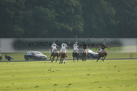 Pluma Negra (white) v Shoreline (black) in the Brecknock Cup Subsidiary final polo match played on Sunday 25 August 2013 at Cowdray Park Polo Club on Ambersham 1. 2013.10.12 www.polopictures.co.uk