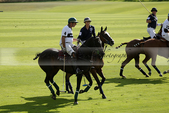 Pandas (white) v Home Farm (navy) in a Park House West Sussex Cup Polo match on Brooksfield at Cowdray Park Polo Club on Friday 30 August 2013. 2013.08.30 www.polopictures.co.uk