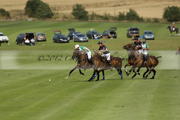 Jaeger Le Coultre (black)  v Wairakei Pastoral (white) in a Jaeger Le Coultre Holden White Cup polo match played on 29 July 2013 at Cowdray Park Polo Club on Brooksfieldwww.polopictures.co.uk