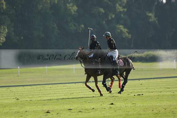Pluma Negra (white) v Shoreline (black) in the Brecknock Cup Subsidiary final polo match played on Sunday 25 August 2013 at Cowdray Park Polo Club on Ambersham 1. 2013.10.12 www.polopictures.co.uk