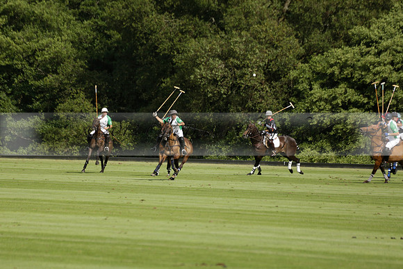 Jaeger Le Coultre (black)  v Wairakei Pastoral (white) in a Jaeger Le Coultre Holden White Cup polo match played on 29 July 2013 at Cowdray Park Polo Club on Brooksfieldwww.polopictures.co.uk