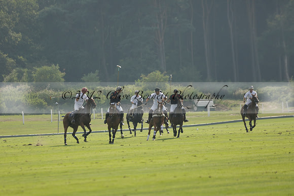 Pluma Negra (white) v Shoreline (black) in the Brecknock Cup Subsidiary final polo match played on Sunday 25 August 2013 at Cowdray Park Polo Club on Ambersham 1. 2013.10.12 www.polopictures.co.uk