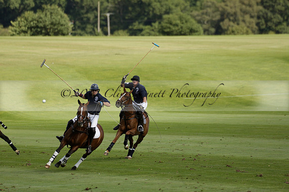 Pandas (white) v Home Farm (navy) in a Park House West Sussex Cup Polo match on Brooksfield at Cowdray Park Polo Club on Friday 30 August 2013. 2013.08.30 www.polopictures.co.uk