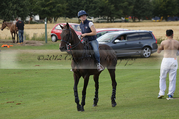 Jaeger Le Coultre (black)  v Wairakei Pastoral (white) in a Jaeger Le Coultre Holden White Cup polo match played on 29 July 2013 at Cowdray Park Polo Club on Brooksfieldwww.polopictures.co.uk