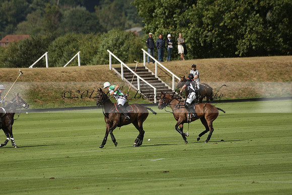 Jaeger Le Coultre (black)  v Wairakei Pastoral (white) in a Jaeger Le Coultre Holden White Cup polo match played on 29 July 2013 at Cowdray Park Polo Club on Brooksfieldwww.polopictures.co.uk