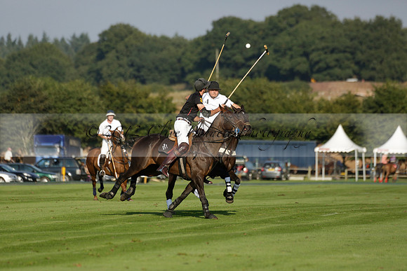Pluma Negra (white) v Shoreline (black) in the Brecknock Cup Subsidiary final polo match played on Sunday 25 August 2013 at Cowdray Park Polo Club on Ambersham 1. 2013.10.12 www.polopictures.co.uk