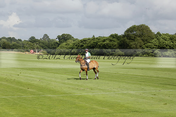 Jaeger Le Coultre (black)  v Wairakei Pastoral (white) in a Jaeger Le Coultre Holden White Cup polo match played on 29 July 2013 at Cowdray Park Polo Club on Brooksfieldwww.polopictures.co.uk