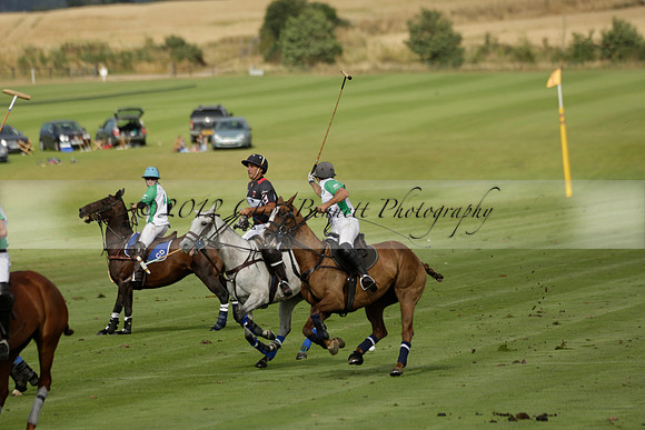 Jaeger Le Coultre (black)  v Wairakei Pastoral (white) in a Jaeger Le Coultre Holden White Cup polo match played on 29 July 2013 at Cowdray Park Polo Club on Brooksfieldwww.polopictures.co.uk