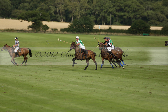 Jaeger Le Coultre (black)  v Wairakei Pastoral (white) in a Jaeger Le Coultre Holden White Cup polo match played on 29 July 2013 at Cowdray Park Polo Club on Brooksfieldwww.polopictures.co.uk