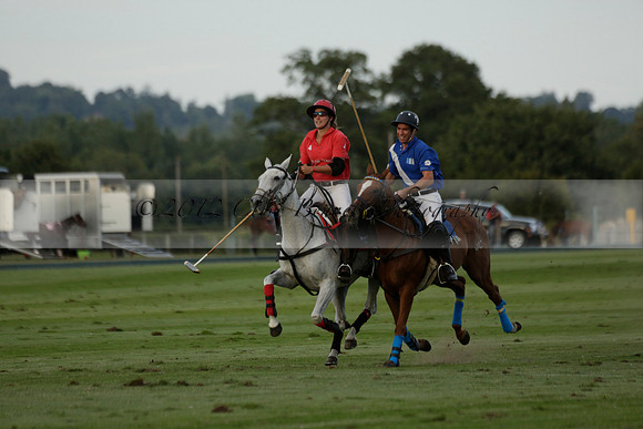 Ghost Chilli (blue) v Team Tonic (red) in a Lodsworth Cup Polo match on Ambersham 3 at Cowdray Park Polo Club on Friday 30 August 2013. 2013.08.30 www.polopictures.co.uk