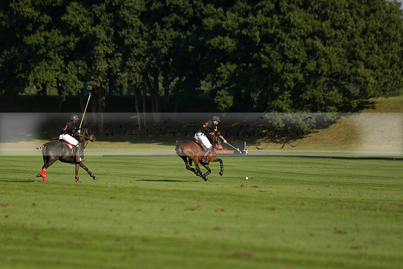 Pluma Negra (white) v Shoreline (black) in the Brecknock Cup Subsidiary final polo match played on Sunday 25 August 2013 at Cowdray Park Polo Club on Ambersham 1. 2013.10.12 www.polopictures.co.uk
