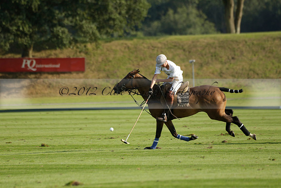 Pluma Negra (white) v Shoreline (black) in the Brecknock Cup Subsidiary final polo match played on Sunday 25 August 2013 at Cowdray Park Polo Club on Ambersham 1. 2013.10.12 www.polopictures.co.uk