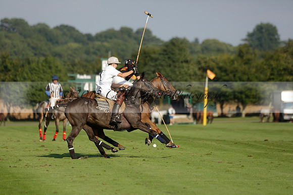 Pluma Negra (white) v Shoreline (black) in the Brecknock Cup Subsidiary final polo match played on Sunday 25 August 2013 at Cowdray Park Polo Club on Ambersham 1. 2013.10.12 www.polopictures.co.uk