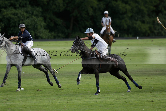 Pandas (white) v Home Farm (navy) in a Park House West Sussex Cup Polo match on Brooksfield at Cowdray Park Polo Club on Friday 30 August 2013. 2013.08.30 www.polopictures.co.uk