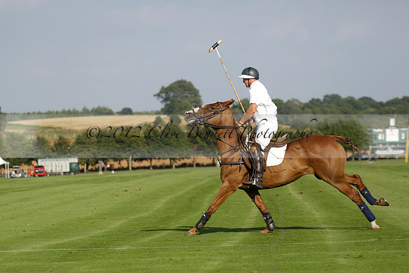 Pluma Negra (white) v Shoreline (black) in the Brecknock Cup Subsidiary final polo match played on Sunday 25 August 2013 at Cowdray Park Polo Club on Ambersham 1. 2013.10.12 www.polopictures.co.uk