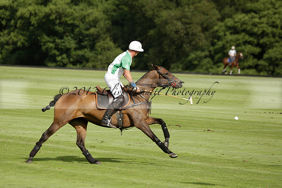 Jaeger Le Coultre (black)  v Wairakei Pastoral (white) in a Jaeger Le Coultre Holden White Cup polo match played on 29 July 2013 at Cowdray Park Polo Club on Brooksfieldwww.polopictures.co.uk