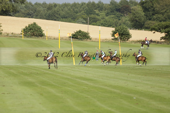 Jaeger Le Coultre (black)  v Wairakei Pastoral (white) in a Jaeger Le Coultre Holden White Cup polo match played on 29 July 2013 at Cowdray Park Polo Club on Brooksfieldwww.polopictures.co.uk