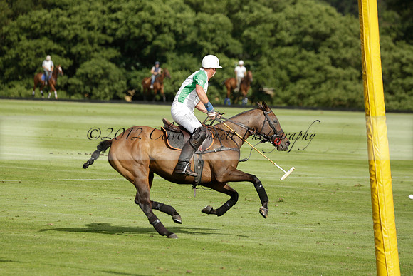 Jaeger Le Coultre (black)  v Wairakei Pastoral (white) in a Jaeger Le Coultre Holden White Cup polo match played on 29 July 2013 at Cowdray Park Polo Club on Brooksfieldwww.polopictures.co.uk
