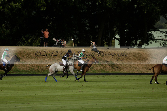 Jaeger Le Coultre (black)  v Wairakei Pastoral (white) in a Jaeger Le Coultre Holden White Cup polo match played on 29 July 2013 at Cowdray Park Polo Club on Brooksfieldwww.polopictures.co.uk