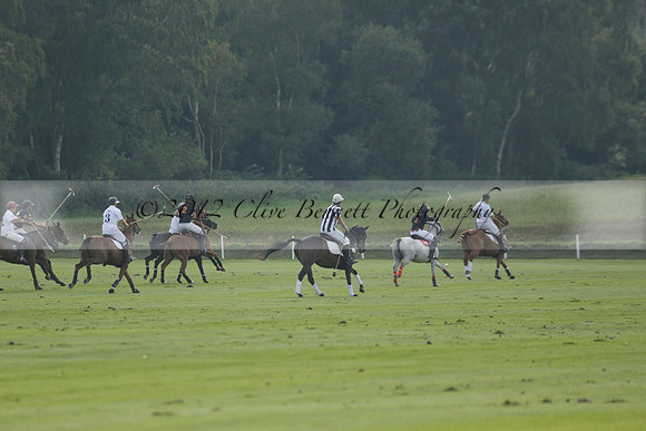 Pluma Negra (white) v Shoreline (black) in the Brecknock Cup Subsidiary final polo match played on Sunday 25 August 2013 at Cowdray Park Polo Club on Ambersham 1. 2013.10.12 www.polopictures.co.uk