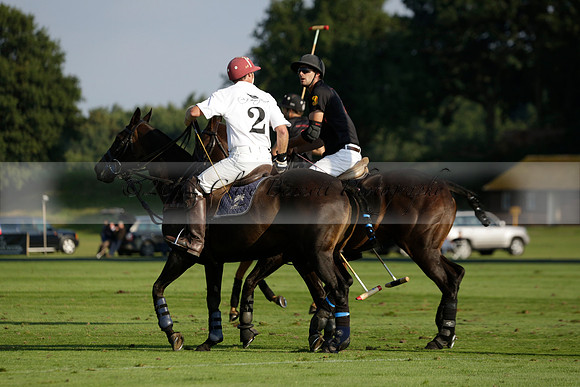 Pluma Negra (white) v Shoreline (black) in the Brecknock Cup Subsidiary final polo match played on Sunday 25 August 2013 at Cowdray Park Polo Club on Ambersham 1. 2013.10.12 www.polopictures.co.uk