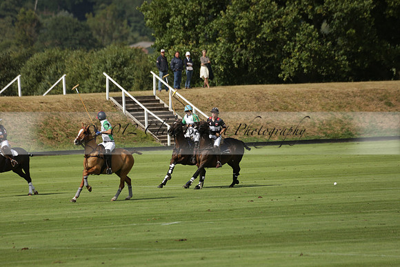 Jaeger Le Coultre (black)  v Wairakei Pastoral (white) in a Jaeger Le Coultre Holden White Cup polo match played on 29 July 2013 at Cowdray Park Polo Club on Brooksfieldwww.polopictures.co.uk