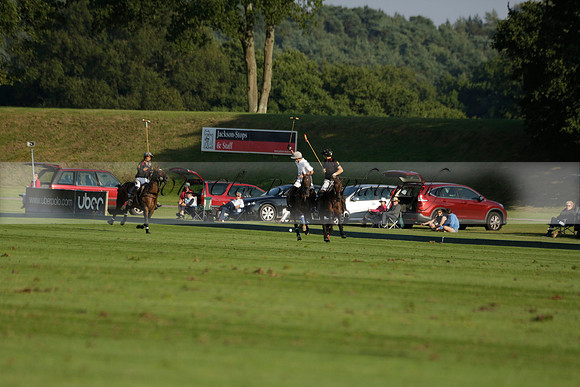 Pluma Negra (white) v Shoreline (black) in the Brecknock Cup Subsidiary final polo match played on Sunday 25 August 2013 at Cowdray Park Polo Club on Ambersham 1. 2013.10.12 www.polopictures.co.uk