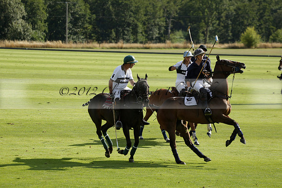 Pandas (white) v Home Farm (navy) in a Park House West Sussex Cup Polo match on Brooksfield at Cowdray Park Polo Club on Friday 30 August 2013. 2013.08.30 www.polopictures.co.uk