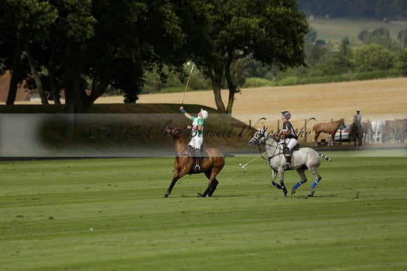 Jaeger Le Coultre (black)  v Wairakei Pastoral (white) in a Jaeger Le Coultre Holden White Cup polo match played on 29 July 2013 at Cowdray Park Polo Club on Brooksfieldwww.polopictures.co.uk
