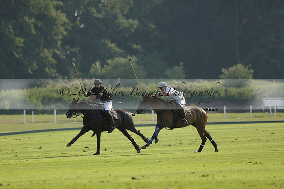 Pluma Negra (white) v Shoreline (black) in the Brecknock Cup Subsidiary final polo match played on Sunday 25 August 2013 at Cowdray Park Polo Club on Ambersham 1. 2013.10.12 www.polopictures.co.uk