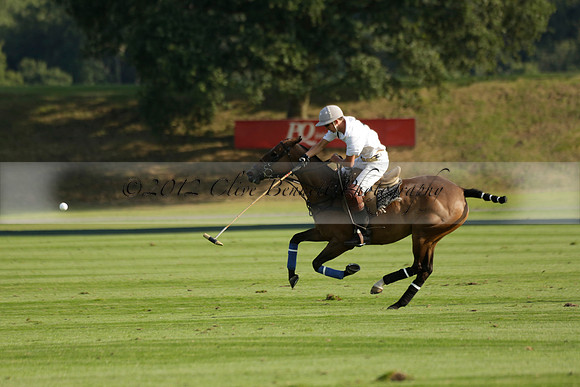 Pluma Negra (white) v Shoreline (black) in the Brecknock Cup Subsidiary final polo match played on Sunday 25 August 2013 at Cowdray Park Polo Club on Ambersham 1. 2013.10.12 www.polopictures.co.uk
