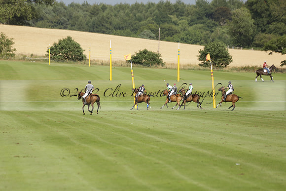 Jaeger Le Coultre (black)  v Wairakei Pastoral (white) in a Jaeger Le Coultre Holden White Cup polo match played on 29 July 2013 at Cowdray Park Polo Club on Brooksfieldwww.polopictures.co.uk